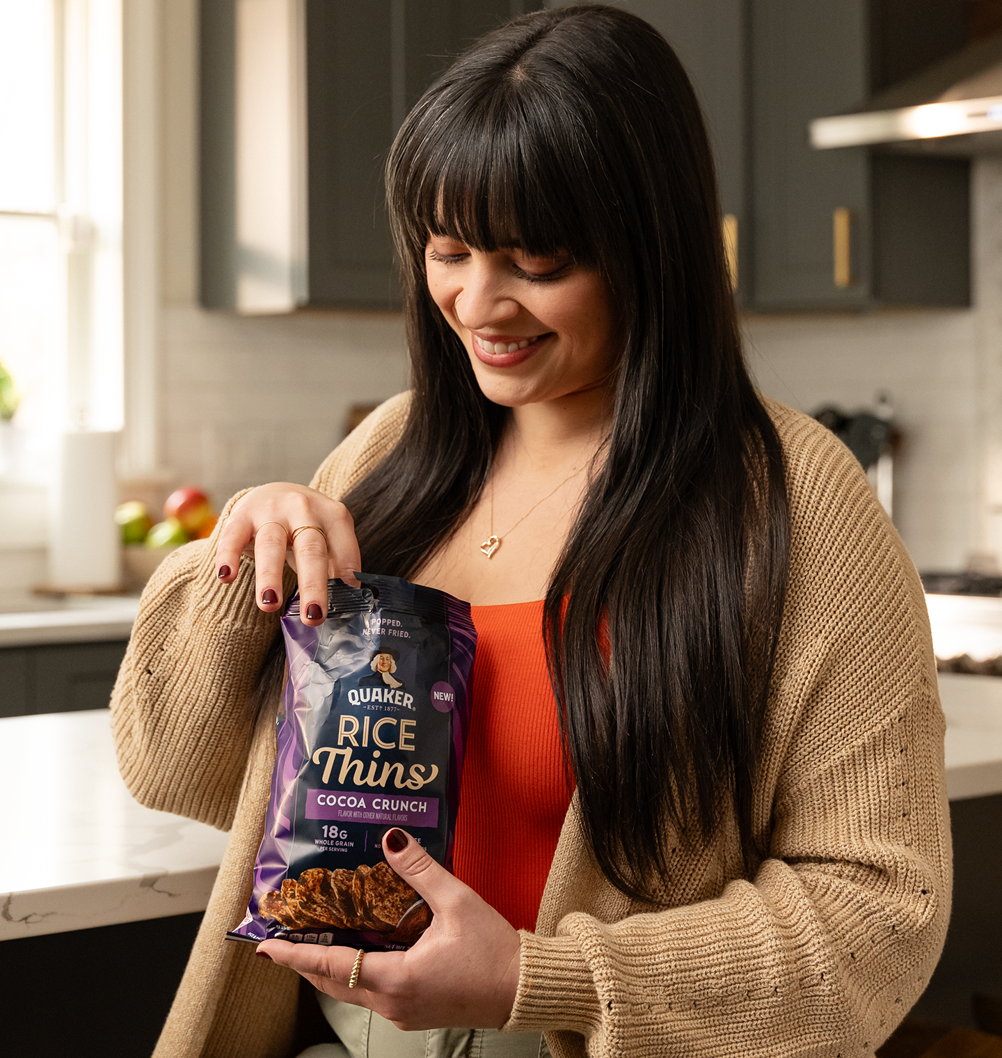 Woman eating Quaker Rice Thins