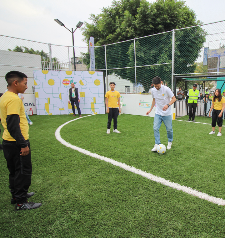 Children playing on a soccer field