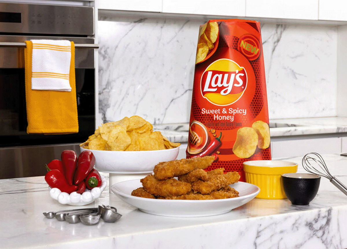 Lay's® says hello to Swicy™ with new Sweet & Spicy Honey flavored potato chips and beloved reality TV duo Cameron & Lauren Hamilton