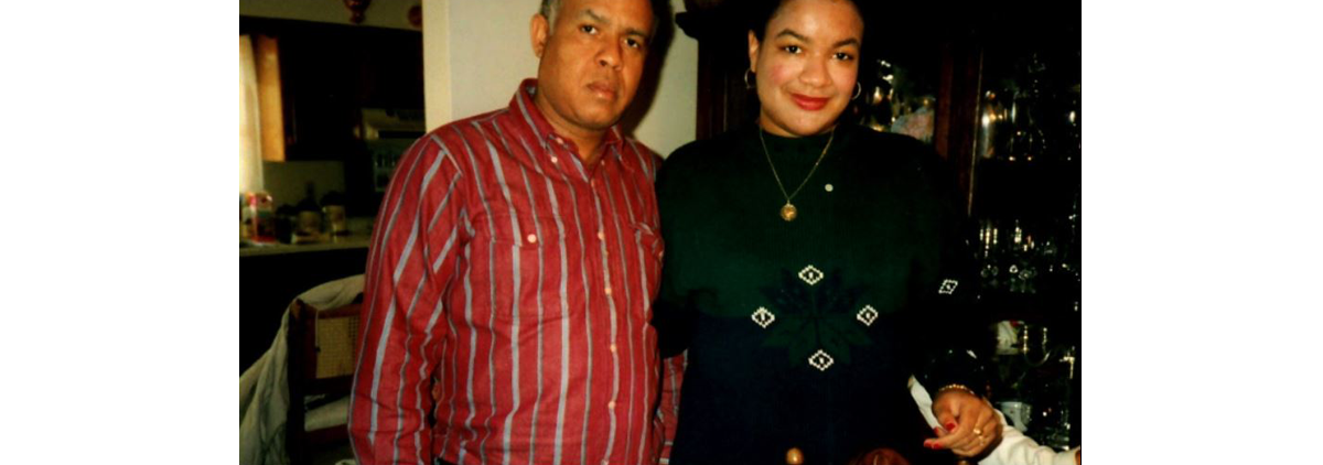 Alexandra Soto standing beside her father