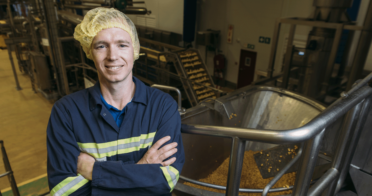 Sean Power standing in a PepsiCo facility